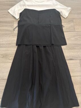Women's Two-Tone Black and White Layered Tee and mid skirt sets